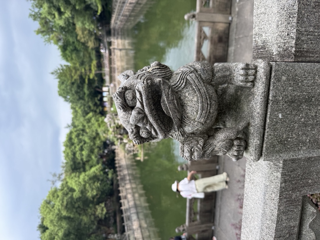 Stone guardian lion statue