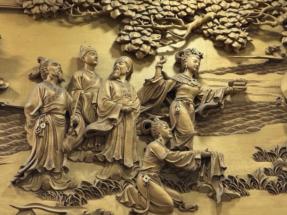 Detailed wood carving inside a pagoda